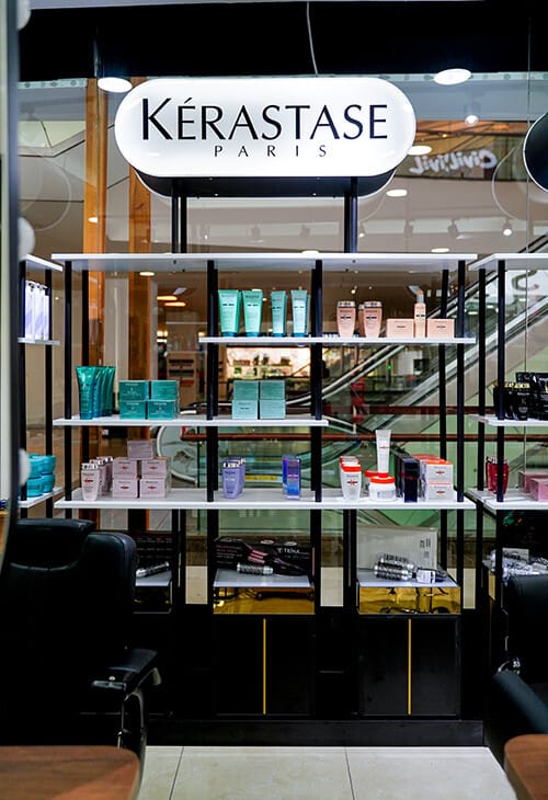 Kérastase Paris professional hair care display at the salon entrance