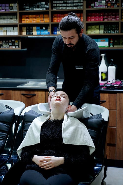 Hair wash and scalp massage at the backwash unit