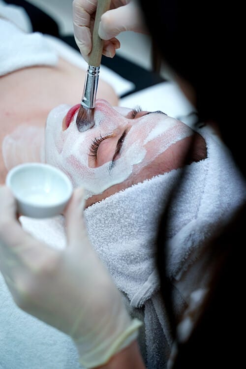 Close-up of a client during a face mask treatment