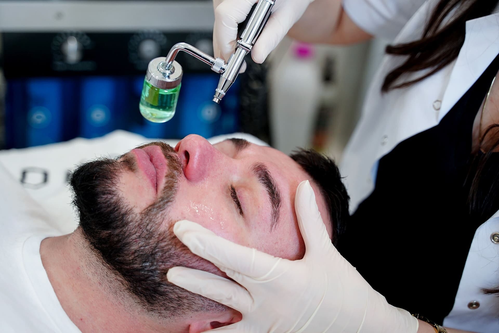 Oxygen-based facial treatment for a male client