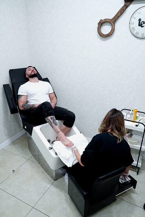 A pedicure session in the treatment chair