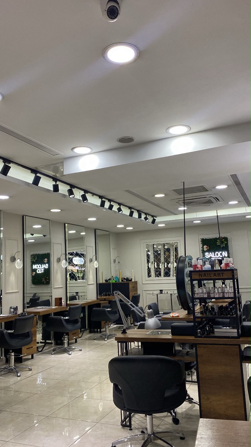 The nail art stand with the hair styling area behind it